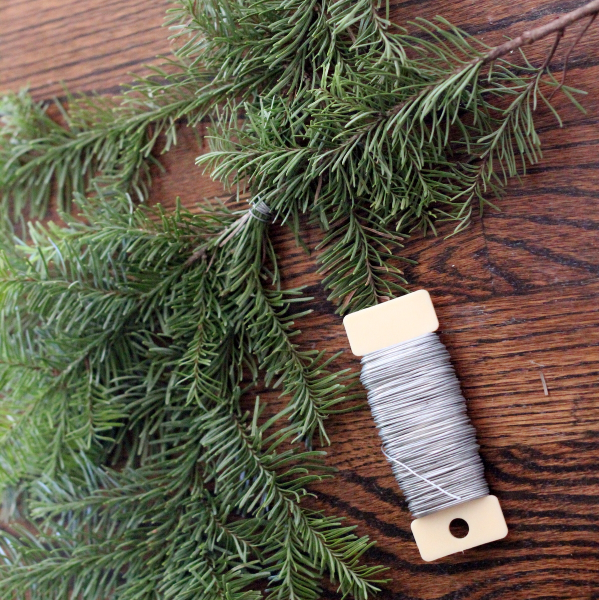 how to make a wreath using extra Christmas tree branches