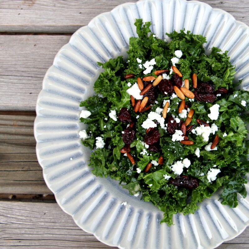 kale salad with tart cherries and pine nuts