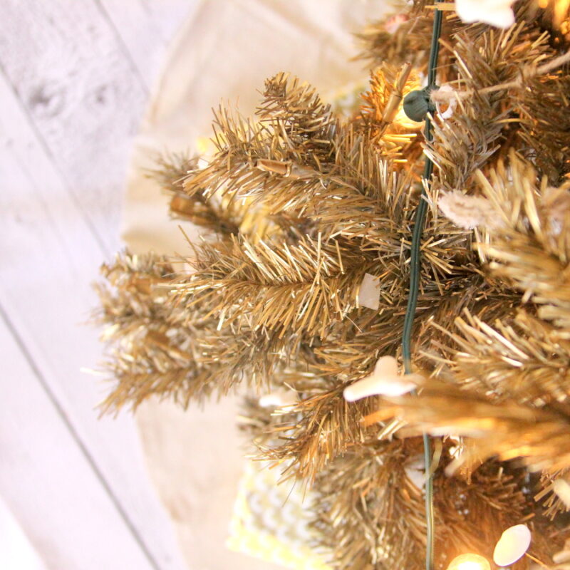 This is the perfect way to give an old fake tree a new look (how to spray paint an artificial christmas tree)!
