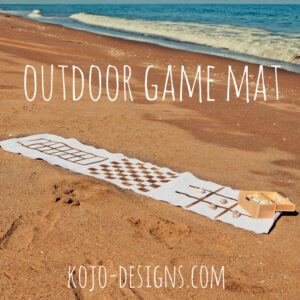use a table runner to make a game board to take with you on your nest outdoor outing!
