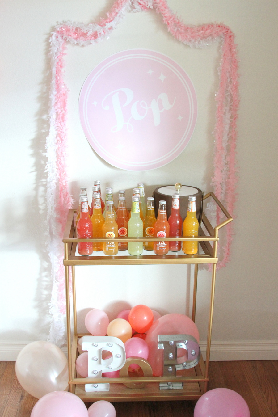 Looking for an easy (and inexpensive!) way to add "wow" to your next party? This Soda Pop Bar is perfection! So cute, but easy on the budget and on the prep time.