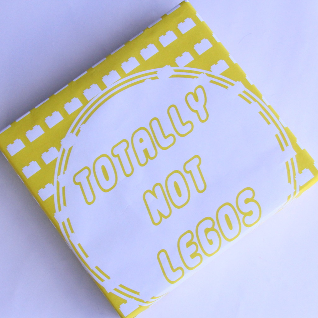 fun (cheeky) way to wrap Legos- free printable gift wrap