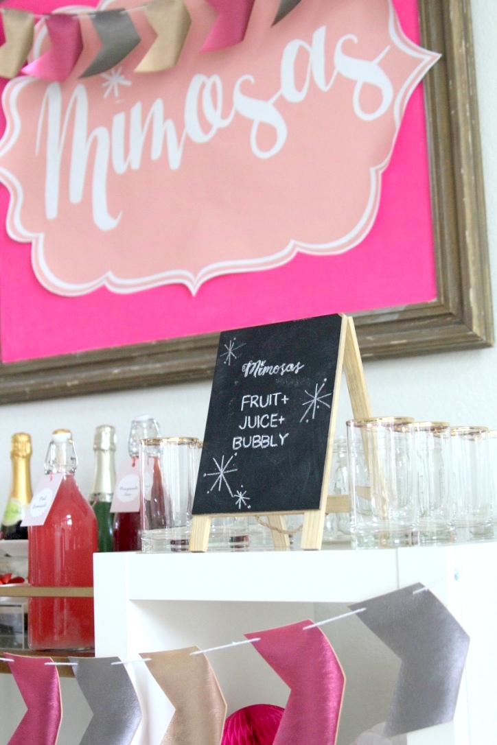 Perfect for baby showers, bridal showers (or even a Valentine's Day bash!)- this pink Mimosa Bar is so fun and SO easy to put together!