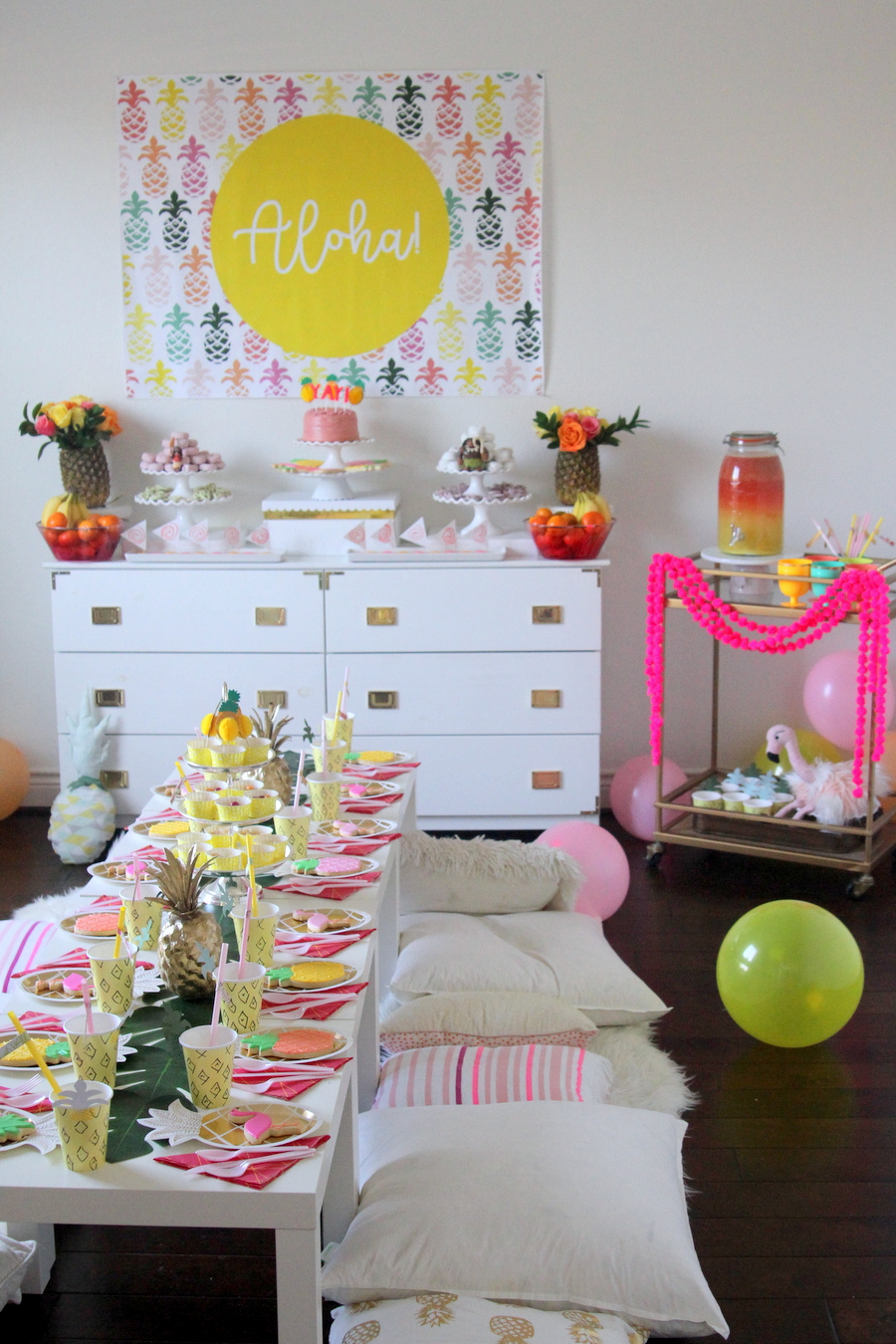 Moana kid's birthday party (with tons of pineapple party decor and a luau vibe)