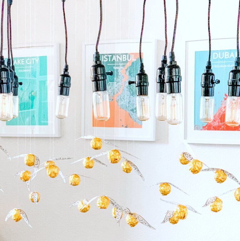 DIY hanging golden snitches (harry potter party)